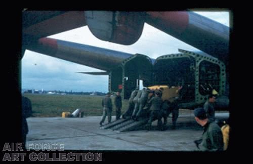 LOADING A C-119 - CIRRUS MANEUVERS